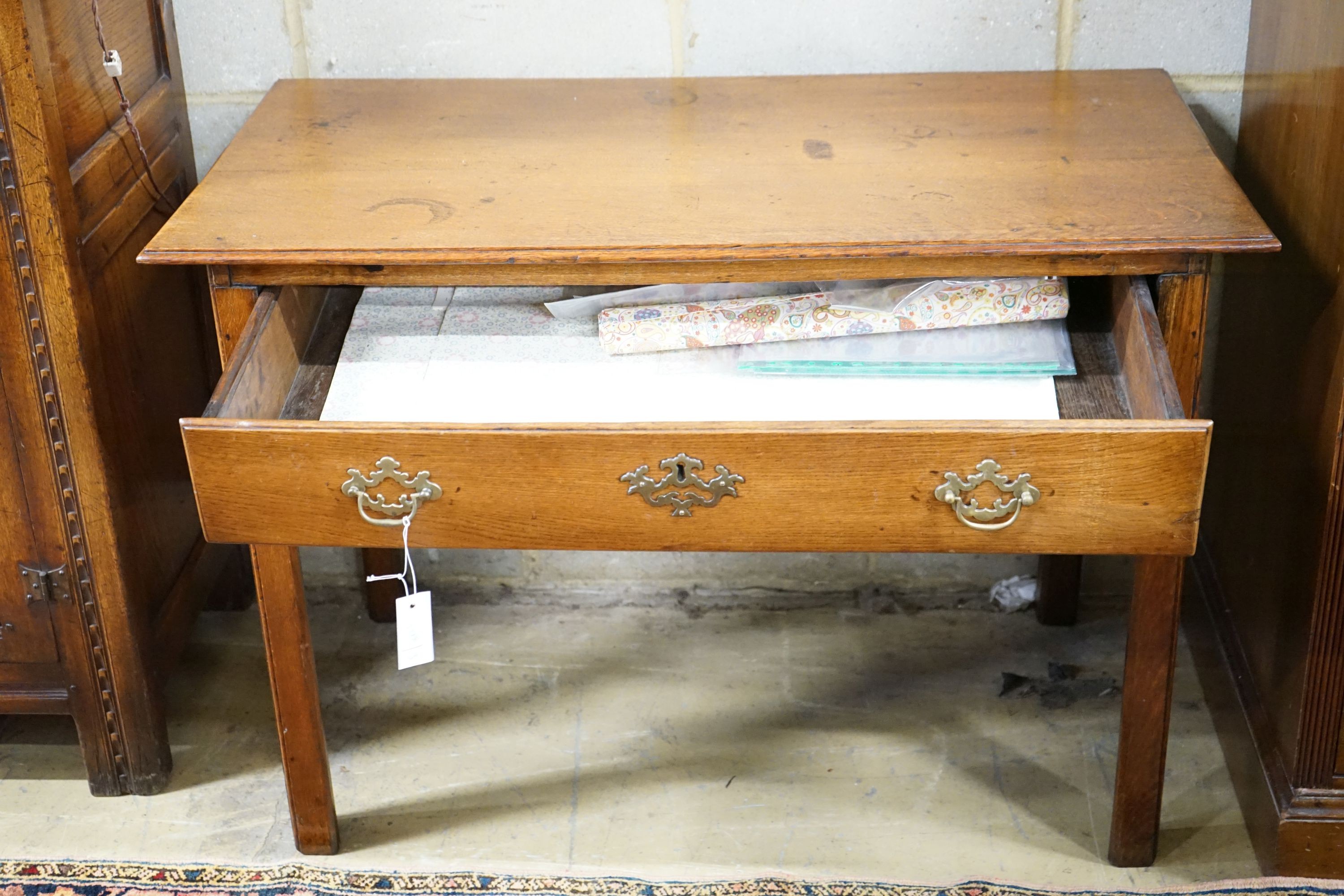 A George III oak side table, width 106cm, depth 57cm, height 72cm